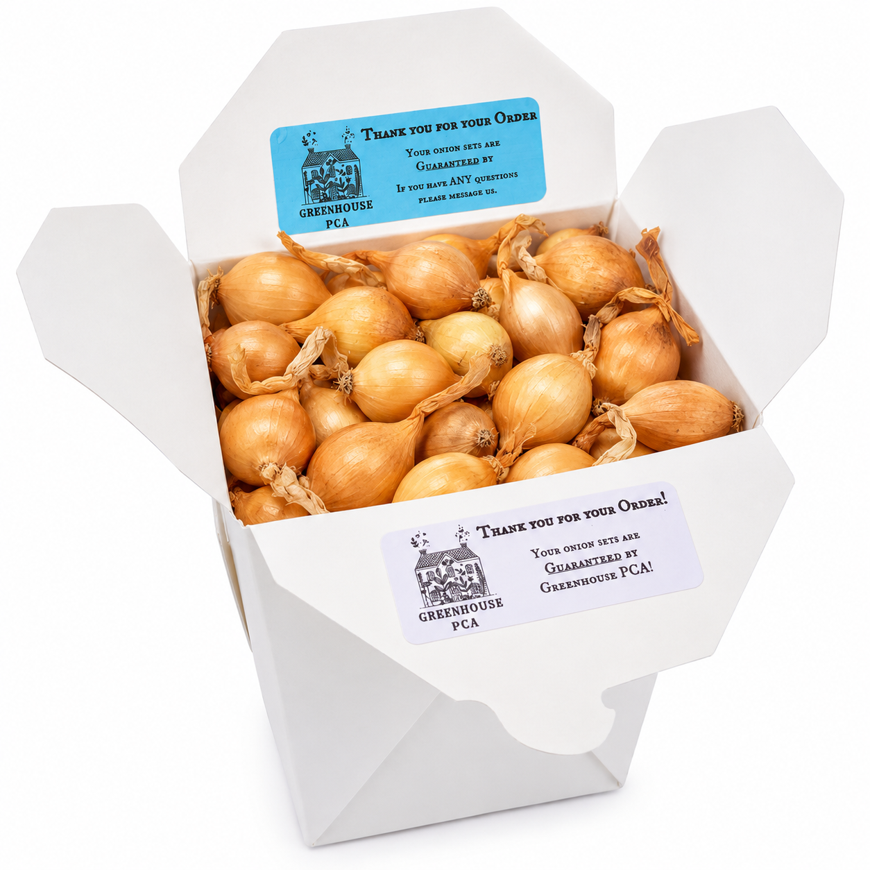 A Greenhouse PCA box packed with yellow onion sets ready for planting